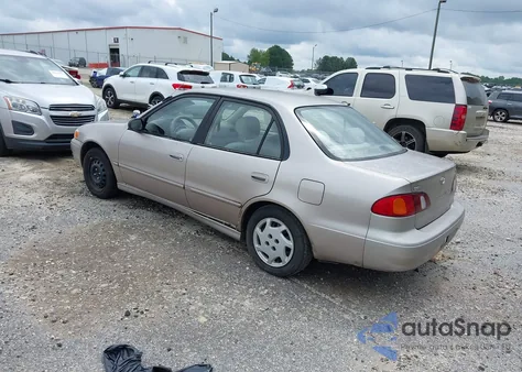 1999 Toyota Corolla Le z USA, uszkodzony, nr VIN 1NXBR12E3XZ238937